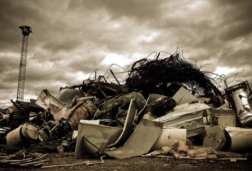 Professional builders clearing construction debris